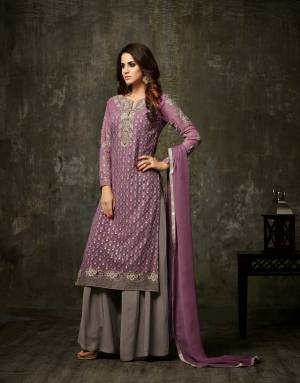 Here Is A Beautiful Designer Straight Cut Suit In Purple Colored Top Paired With Contrasting Grey Colored Plazzo And Dupatta. Its Top And Plazzo Are Fabricated On Georgette Paired With Santoon Bottom And Chiffon Dupatta. It Is Light Weight And Easy To Carry All day Long.