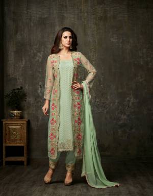 Look Pretty In This  Designer Straight Cut Suir In Pastel Green Colored Top Paired With Pastel Green Colored Bottom And Dupatta. Its Top Is Fabricated On Georgette And Net As Its Comes With Jacket Pattern, Paired With Embroidered Santoon Bottom And Chiffon Dupatta. This Designer Suit Will Earn You Lots Of Compliments From Onlookers.