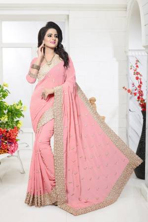 Look Pretty Wearing This Saree In Baby Pink Color Paired With Baby Pink Colored Blouse. This Saree And Blouse Are Fabricated On Georgette With Heavy Moti Work Making The Saree More Attractive. Buy IT Now.
