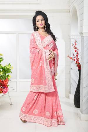 Look Pretty Wearing This Saree In Baby Pink Color Paired With Baby Pink Colored Blouse. This Saree And Blouse Are Fabricated On Georgette With Heavy Thread  Work Making The Saree More Attractive. Buy IT Now.