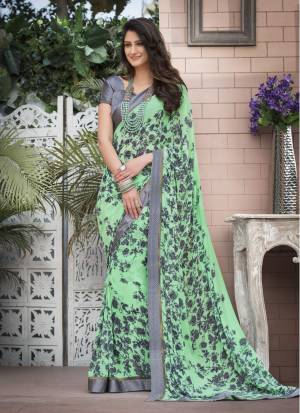 For Your Semi-Casual Wear, Grab This Pretty Saree In Light Green Color Paired With Contrasting Grey Colored Blouse. This Saree Is Fabricated On Georgette Paired With Satin Fabricated Blouse. This Saree Is Light Weight And Easy To Carry All Day Long.