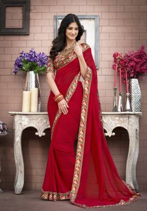 Adorn The Angelic Look Wearing This Saree In Red Color Paired With Multi Colored Blouse. This Saree Is Fabricated On Georgette Paired With Satin Fabricated Blouse. This Pretty Saree Can Be Wore At Any Festival Or Semi-Casually.