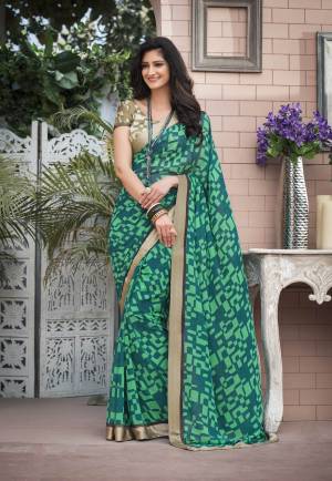 For Your Semi-Casual Wear, Grab This Pretty Saree In Light Green Color Paired With Contrasting Khaki Colored Blouse. This Saree Is Fabricated On Georgette Paired With Satin Fabricated Blouse. This Saree Is Light Weight And Easy To Carry All Day Long.