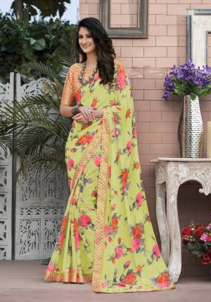 Look Pretty In This Yellow Colored Saree Paired With Cream And Orange Colored Blouse. This Saree Is Fabricated On Georgette Paired With Satin Fabricated Blouse. It Has Bold Floral Prints All Over The Saree. Buy Now.