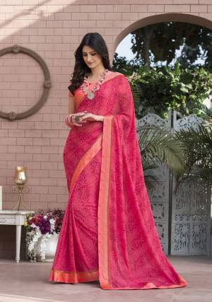 Look Pretty Wearing This Saree In Pink Color Paired With Pink Colored Blouse. This Saree Is Fabricated On Georgette Paired With Satin Fabriacted Blouse. This saree IS Suitable For Any Festive Wear, Formal Function Or Semi-Casual Wear.