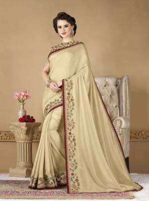 Simple, Elegant And Rich Looking Saree IS Here With This Beige Colored Saree Paired With Beige Colored Blouse. This Saree Is Fabriacated On Art Silk Paired With Art Silk Fabricated Blouse. It Is Beautified With Multi Colored Embroidery Over The Blouse And Lace Border.