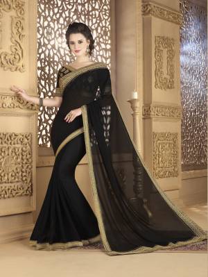 Enhance Your Beauty wearing This Saree In Black Paired With Black Colored Blouse. This Saree Is Fabricated On Georgette Paired With Art Silk Fabricated Blouse. This Designer Saree Is Beautified With Heavy Embroidered Blouse And Lace Border. 