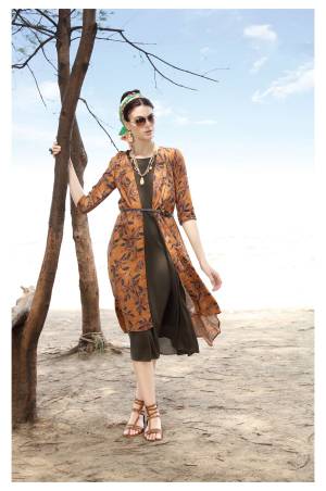 Another Jacket Patterned Readymade Kurti Is Here In Brown Color Fabricated On Rayon Cotton Whose Jacket Has Small Floral Prints All Over. 