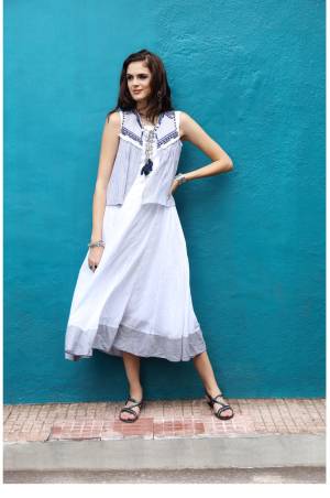 Beat The Heat Wearing This Light Colored Kurti, It Is In White Color Fabricated On Soft Cotton. Buy This Pretty Kurti Before The Stock Ends.
