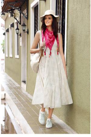 Catch Up The Upcoming Trend With This Lovely Kurti In Off-White Color Fabricated On Soft Cotton. It Comes With This Pretty Pink Colored Scarf. 