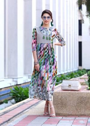 Go Colorful Wearing This Readymade Kurti In Multi Color Fabricated On Georgette. It Is Beautified With Floral And Geometric Prints. Buy Now.