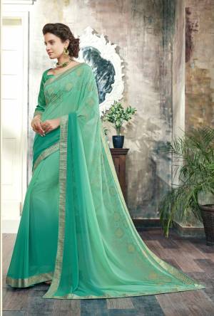 Very Pretty Shade Of Green Is Here With This Sea Green Colored Saree Paired With Sea Green Colored Blouse. This Saree Is Fabricated On Georgette Paired With Art Silk Fabricated Blouse. It Is Beautified with Stone Work. Buy Now.