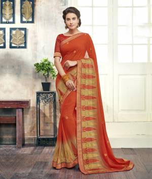 Orange Color Induces Perfect Summery Appeal To Any Outfit, So Grab This Saree In Orange Color Paired With Orange Colored Blouse, This Saree Is Fabricated On Georgette Paired With Art Silk Fabricated Blouse. It Has Broad Embroidered Lace Border. Buy Now.