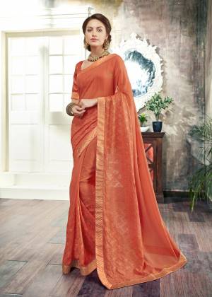 Orange Color Induces Perfect Summery Appeal To Any Outfit, So Grab This Saree In Light Orange Color Paired With Light Orange Colored Blouse, This Saree Is Fabricated On Georgette Paired With Art Silk Fabricated Blouse. It Has Broad Embroidered Lace Border. Buy Now.