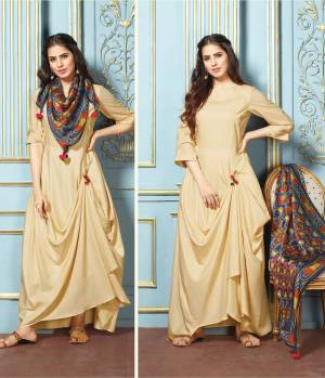 Here Is A Beautiful Drape Patterned Kurti In Cream Color Fabricated On Silk Satin Paired With A Multi Colored Printed Scarf Fabricated On silk Satin. Its Fabrics Are Soft Towards Skin And Easy To Carry All Day Long.
