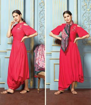 Look Pretty Wearing This Bright Colored Kurti In Pink Fabricated On Rayon Cotton. This Kurti Is Paired With A Multi Colored Scarf Fabricated On Silk Satin. It Is Soft Towards Skin And Also Easy To Carry All Day Long.