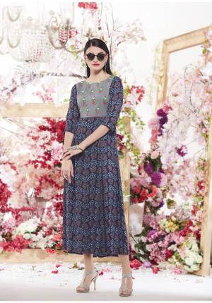 Grab ThisSemi-Casual wear Kurti In Navy Blue Color Fabricated On Cotton Beautified With Printed And Resham Work. This Readymade Kurti Is Available In Many Sizes. Buy Now.