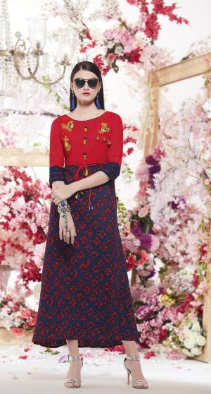 For Your Semi-Casual Wear, Grab This Kurti In Red And Blue Color Fabricated On Cotton. This Kurti Is Light Weight And Easy To Carry All Day Long. Buy Now.