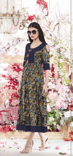 Look Beautiful Wearing This Readymade Kurti In Blue And Multi Color Beaitified With Prints All Over It. Buy This Kurti Now.
