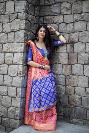 Look Pretty In this Pink Colored Saree Paired With Contrasting Royal Blue Colored Blouse. This Saree And Blouse Are Fabricated On Jacquard Silk Beautified With Weave All Over It. Its Lovely Combination Will Earn You Lots Of Compliments From Onlookers.