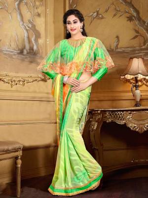 Grab This Designer Saree In Yellow Color Paired With Green Colored Blouse And Yellow Colored Cape. This Saree Is Fabricated On Georgette Brasso Paired With Crepe Fabricated Blouse And Net Fabricated Cape. Its All Three Fabrics Ensures Superb Comfort All Day Long. Buy Now.