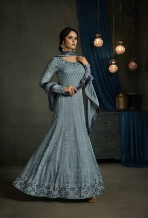 The Color Says It All, Grab This Beautiful And Elegant Designer Floor Length Suit In Steel Blue Color Paired With Steel Blue Colored Bottom And Dupatta. Its Top Is Fabricated On Georgette Paired With Santoon Bottom And Chiffon Dupatta. It Has Heavy Embroidery All Over Still It Is Soft Towards Skin And Easy To Carry All Day Long.
