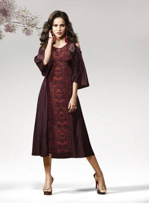 You Will Definitely Earn Lots Of Compliments Wearing This Readymade Kurti In Dark Brown Color Fabricated On Crepe Silk Which Is Soft Towards Skin And Easy To Carry All Day Long. This Kurti Is Beautified With Prints And Patch Work. Buy Now.