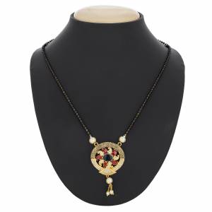 Grab This Pretty Simple Magalsutra For Your Daily Wear That Can Be Paired With Any Outfit. Its Pendant Is In Golden Color Beautified with Multi Colored Stones. Buy Now.