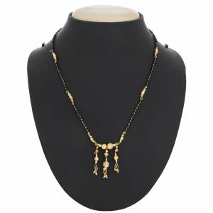 A Bit Traditional Patterened Mangalsutra Is Here In Golden And Black. This Pattern Looks More Rich With Saree And Suits.  Buy It Now.