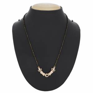 Elegant Looking Mangalsutra Is Here In Golden Colored Pendant Beautified with White Colored Stones And Pearl. It Is Light Weight And Easy To Carry All Day Long.