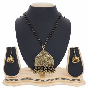 Here Is A Beautiful, Traditonal And Heavy Looking Magalsutra Is Here Paired With Matching Earrings. This Magalsutra Is For Occasion Wear That Can Be Paired With Any Traditional Attire. Buy Now.