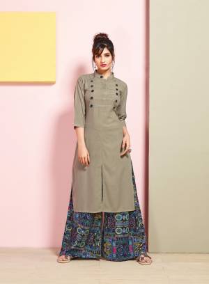 Elegant And Rich Looking Kurti Set Is Here In Grey Colored Kurti Paired With Blue Colored Plazzo. This Both Kurti And Plazzo Are Fabricated On Rayon Cotton. Beautified With Prints. Buy This Readymade Set Of Kurti And Plazzo Now.