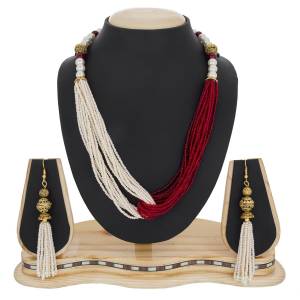 Double Colored Designer Necklace Set Is Here In White And Maroon Beautified with Moti Chains. This Necklace Set Is Light Weight And Easy To Carry Throughout The Gala.