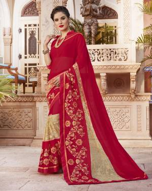 Adorn The Lovely Angelic Look Wearing This Saree In Red Color Paired With Red Colored Blouse. This Saree Is Fabricated On Georgette Paired With Art Silk Fabricated Blouse. Its Broad Embroidered Border Will Make You Earn Lots Of Compliments From Onlookers.