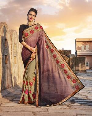 New And Unique Combination With Different Shades are Here In Designer Saree, This Saree Is In Mauve And Beige Color Paired With Brown Colored Blouse. This Saree Is Fabricated On Art Silk Paired With Art Silk Fabricated Blouse. It Is Beautified With Contrasting Embroidery Over The Lace Border.