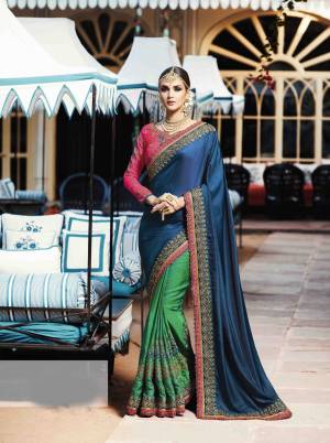 Go Colorful Wearing This Saree In Blue And Green Color Paired With Contrasting Pink Colored Blouse. This Saree Is Fabricated On Satin Silk Paired With Art Silk Fabricated Blouse. This Heavy Saree Is Suitable For All Occasion Wear. Buy Now.