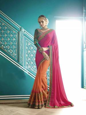 Get Ready For The Upcoming Wedding Season With This Designer Saree In Pink And Orange Color Paired With Contrasting Teal Green Colored Blouse. This Saree Is Fabricated On Satin Silk Paired With Satin Silk Fabricated Blouse. It Also Ensures Superb Comfort All Day Long. Buy Now.