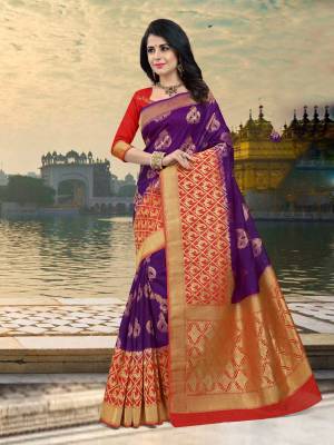 Grab this Silk Saree In Purple Color Paired With Contrasting Red Colored Blouse. This Saree And Blouse Are Fabricated On Art Silk Beautified With Weave. This IS Suitable For Any Social Function Or Festive Wear.