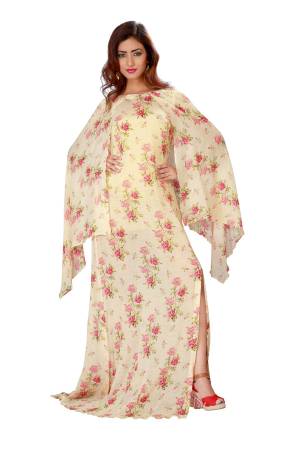 Another Cape Sleeves Patterned Readymade Gown Is Here In Cream Color Fabricated On Chiffon Beautified With Floral Prints. Buy This Now.