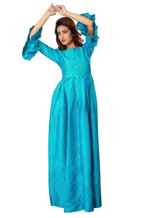For Your Semi-Casual Wear, Grab This Pretty Readymade Gown In Blue Color Fabricated On Linen Silk. It Is Soft Towards Skin And Easy To Carry All Day Long.