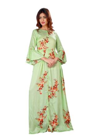 This Season Is About Subtle Shades And Pastel Play, So Grab This Designer Readymade Gown In Pastel Green Color Fabricated On Satin. It Is Beautified With Floral Prints. This Gown Is Light In Weight And Easy To Carry All Day Long. 