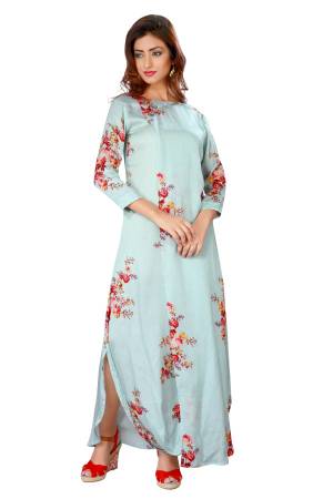 Look Beautiful In This Readymade Gown In Baby Blue Color Fabricated On Cotton Satin Beautified With Floral Prints. This Gown Is Light Weight And Easy To Carry All Day Long.