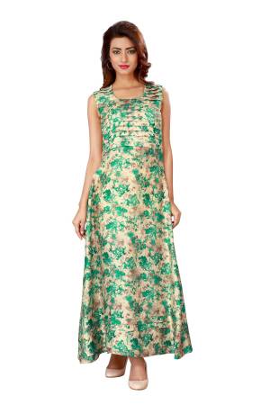 Grab This Abstract Printed Readymade Gown In Cream And Green Color Fabricated On Art Silk. This Gown Is Available In Many Sizes. Buy Now.