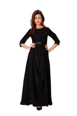 For A Designer Look, Grab This Elegant Looking Readymade Gown In Black Color Fabricated On Cotton Satin. It Has Beautiful Drape Pattern Which Will Earn You Lots Of Complimets From Onlookers. Buy Now.