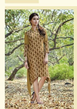 Go Colorful With This Readymade Multi Colored Kurti Fabricated On Rayon Cotton, This Readymade Kurti Is Available In Sizes So Choose As Per Your Desired Fir And Comfort.