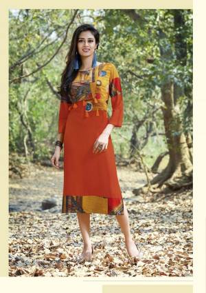 Orange Color Induces Perfect Summery Appeal To Any Outfit, And What Is Better Than Kurti Which Ensures Superb Comfort. Grab This Readymade Kurti In Orange Color Fabricated On Rayon Cotton And Available In Many Sizes.