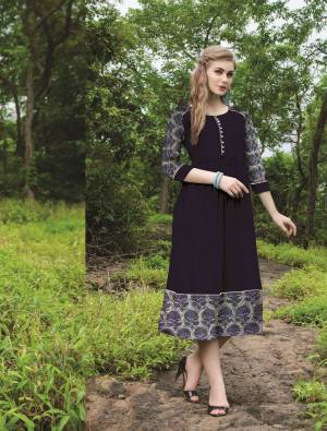 Dark Colors Always Gives A More Pretty And Attractive Look, So Grab This Readymade Kurti In Dark Blue Color Fabricated On Cotton Beautifeid With Prints. It Is Light Weight And Easy To Carry All Day Long.