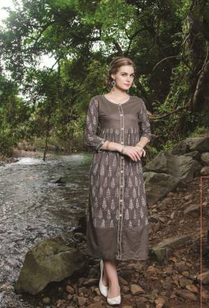 Flaunt Your Rich And Elegant Taste Wearing This Readymade Kurti In Grey Color Fabricated On Cotton Beautified With Prints. This Kurti Is Light Weight And Easy To Carry All Day Long.