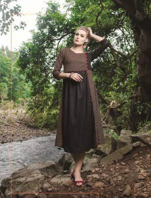 Enhance Your Beauty Wearing This Readymade Kurti In Black Color Fabricated On Cotton Beautified With Prints. It Has Beautiful Yoke Pattern Which Ensures Superb Comfort All Day Long. Buy This Pretty Kurti Now.