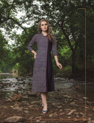 Add This Pretty Kurti To Your Wardrobe In Purple Color Fabricated On Cotton. It Is Beautified With Prints And Also This Readymade Kurti Is  Available In Many Sizes. Buy Now.